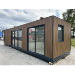 contenedor-113-metros-33m2-con-aseo-completo-y-cocina-.png